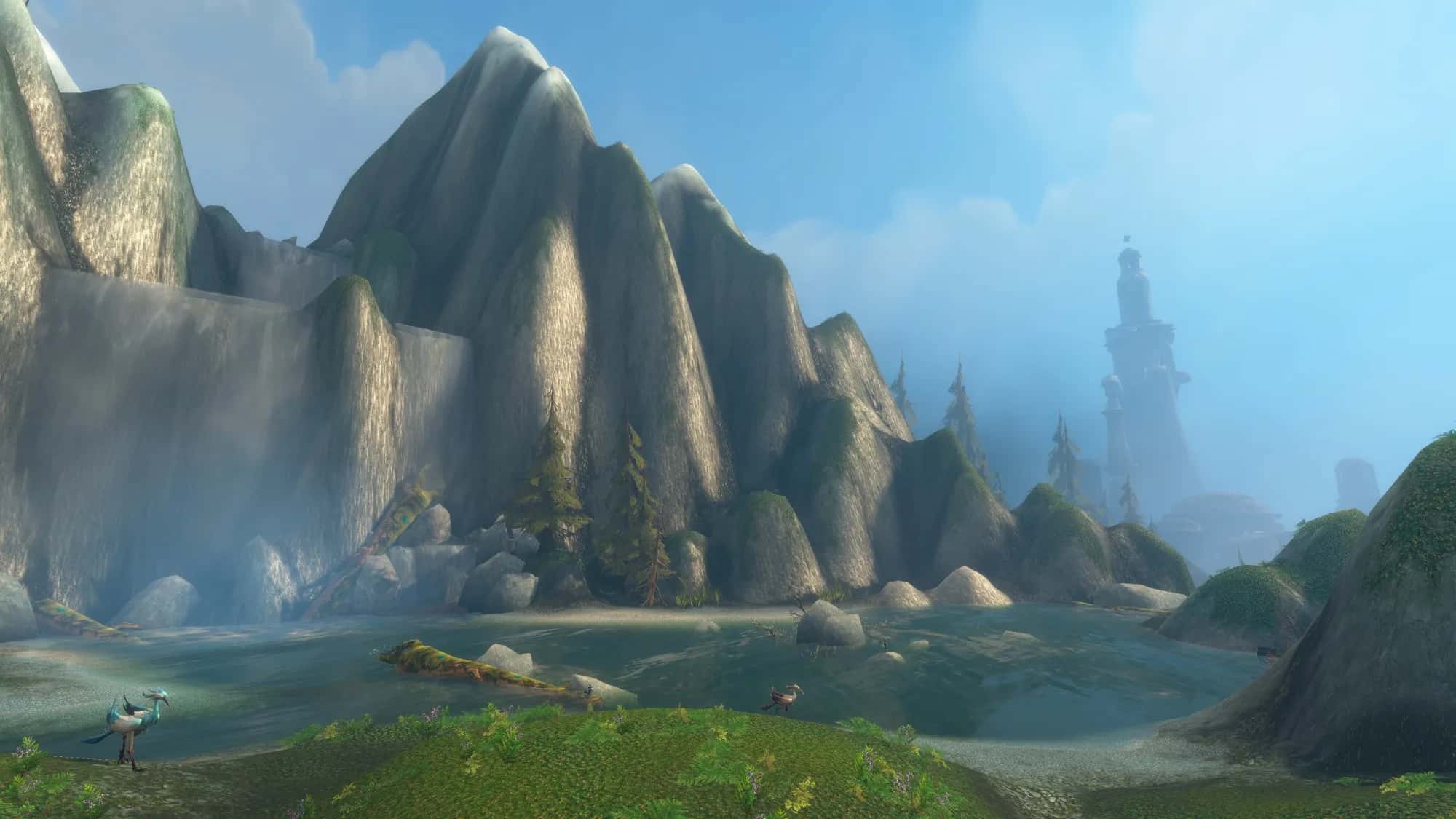 A rocky coast with a shallow bay, distant tower, and two tallstriders
